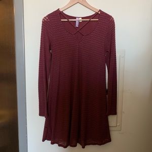 Maroon shirt dress, long sleeved.